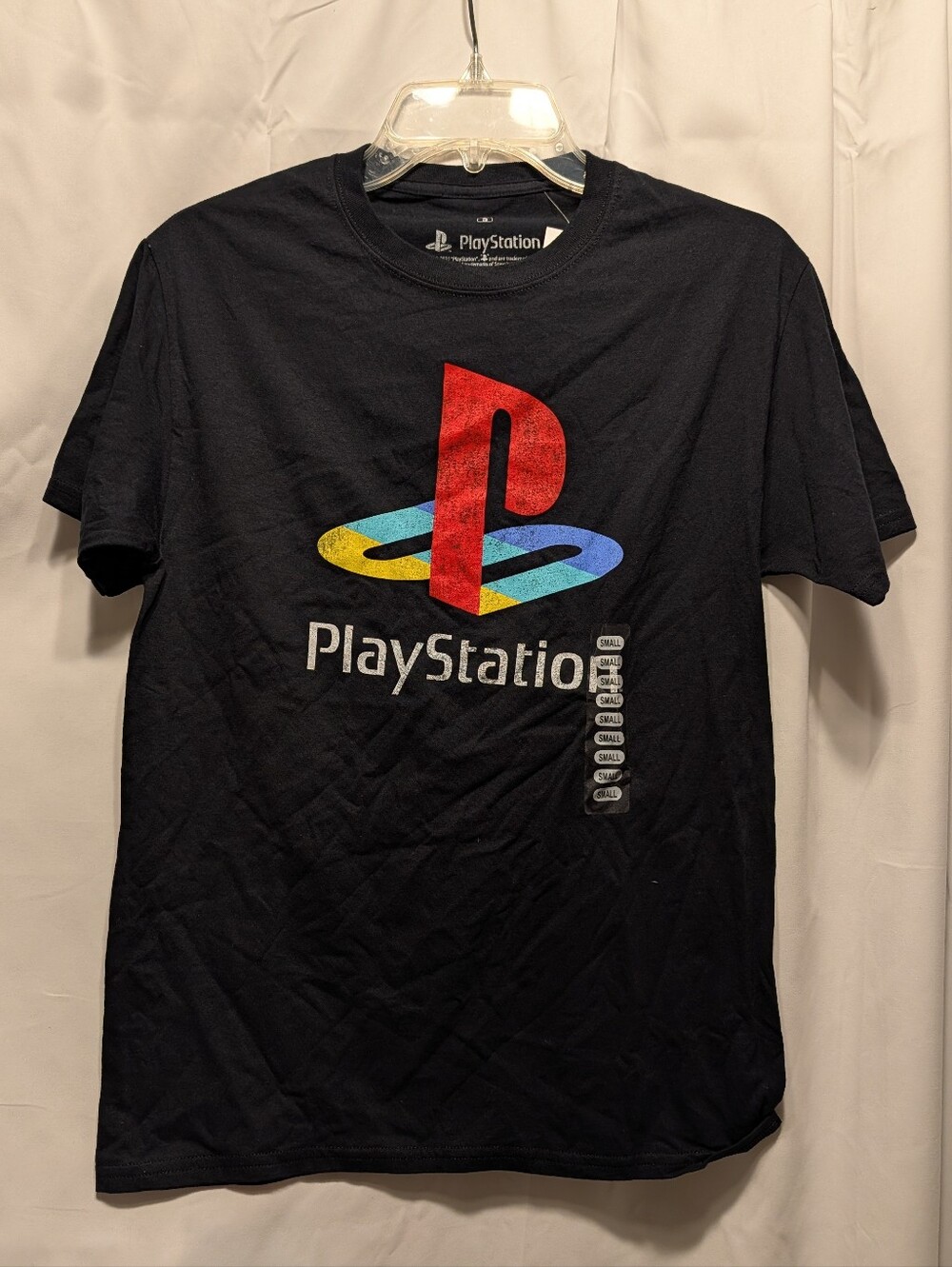 NWT. Sony PlayStation Black Tee with Red, Yellow & Blue Logo. Size Small.
